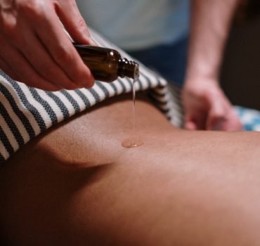 person giving a massage at massage therapy centre hackney